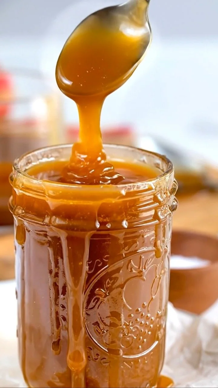 Thanksgiving Salted Caramel Dessert Sauce Thanksgiving Salted Caramel Dessert Sauce drizzled over a pie.