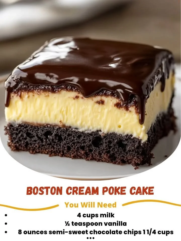 Delicious slice of Boston Cream Poke Cake with chocolate frosting and cream filling