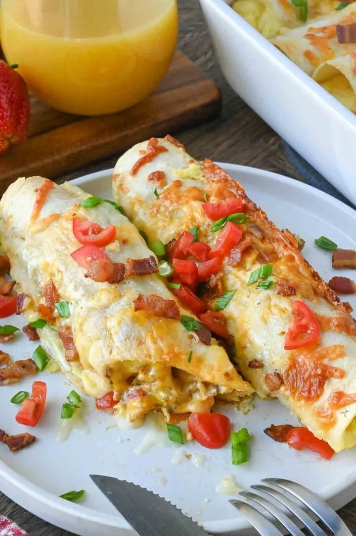 Delicious Breakfast Enchiladas topped with fresh cilantro and avocado