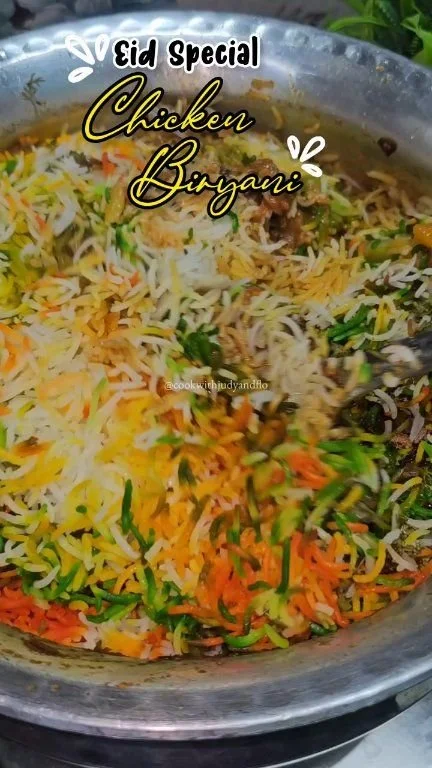 Delicious Chicken Biryani served in a traditional Indian style bowl.