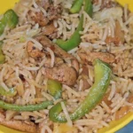 Delicious Chicken Fajita Rice served with colorful vegetables and spices