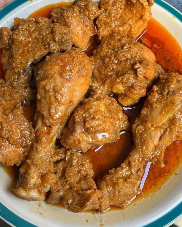 Delicious Chicken Korma served in a bowl with fragrant spices and herbs