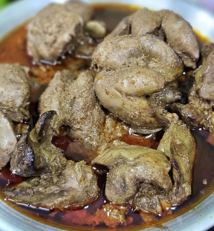 Delicious Chicken Liver Masala served in a bowl with spices and herbs