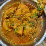 Delicious Chicken Masala dish prepared in restaurant style, garnished and ready to serve.