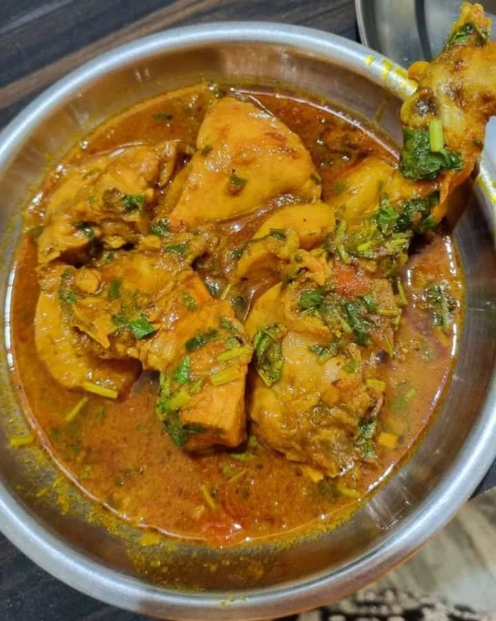 Delicious Chicken Masala dish prepared in restaurant style, garnished and ready to serve.