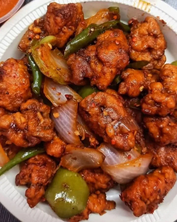 Deliciously spiced Chili Chicken Dry served on a plate