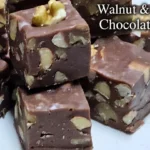 home Delicious Christmas Fudge served on a festive plate