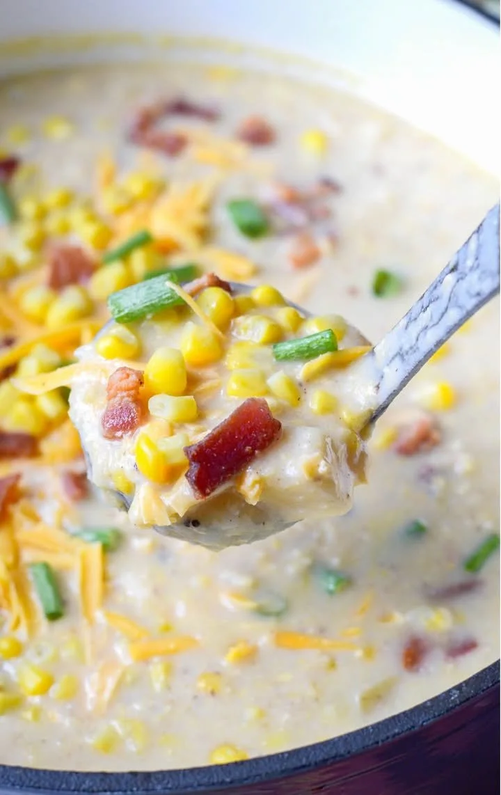 Creamy Sweet Corn Chowder Bowl of creamy sweet corn chowder topped with fresh herbs.