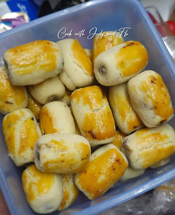 Homemade date rolls made with nuts and coconut, a healthy snack option.