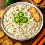 Delicious Jalapeño Artichoke Dip served in a bowl with tortillas