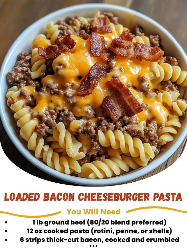 Loaded bacon cheeseburger pasta skillet topped with melted cheese and crispy bacon