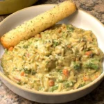 home One-Pot Cheesy Chicken and Broccoli Orzo dish served in a bowl