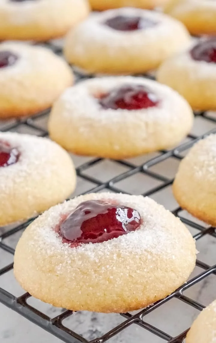 Delicious Raspberry Thumbprint Cookies with raspberry jam filling