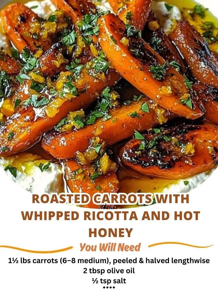 Plate of roasted carrots topped with whipped ricotta and drizzled with hot honey