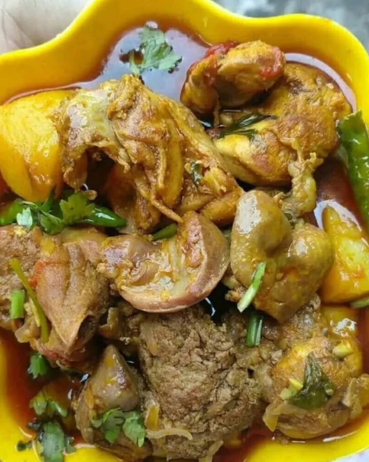 Delicious plate of simple chicken curry cooked with spices and served with rice.