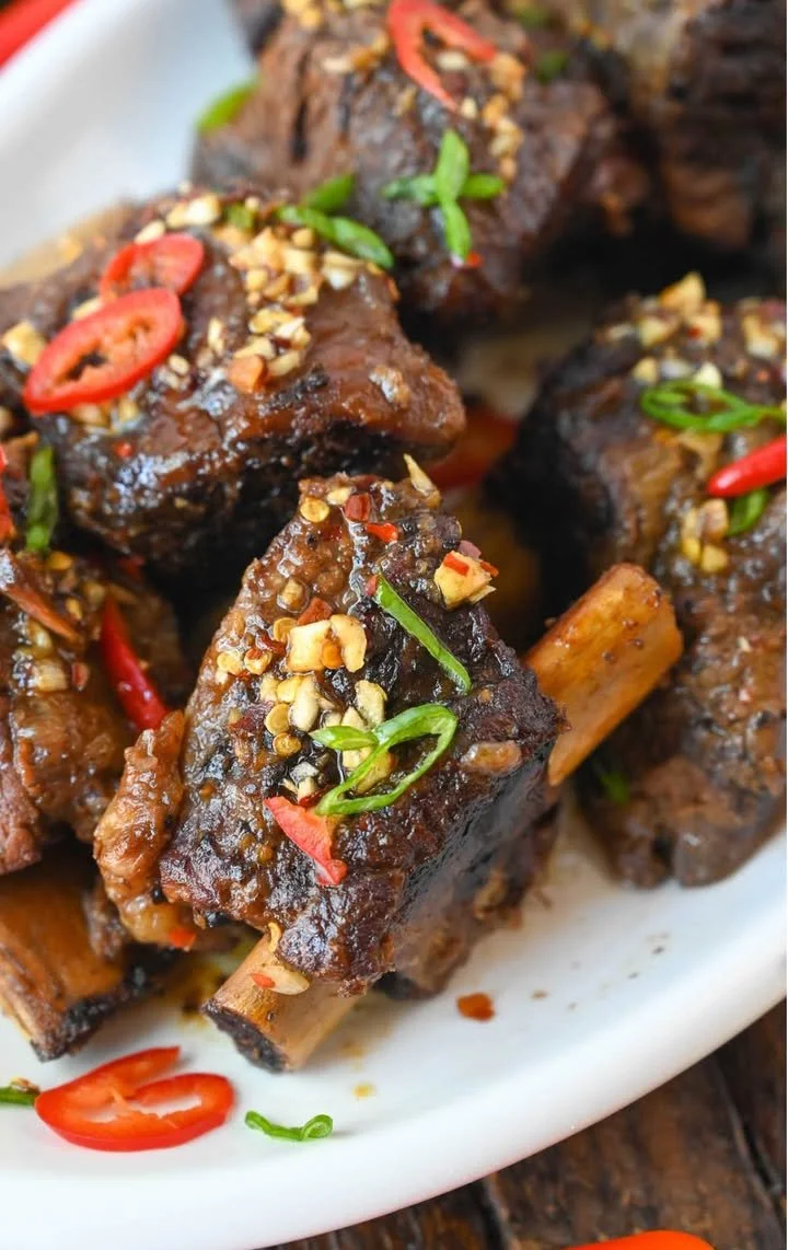 Slow Cooker Asian Beef Short Ribs Delicious Slow Cooker Asian Beef Short Ribs served with sesame seeds