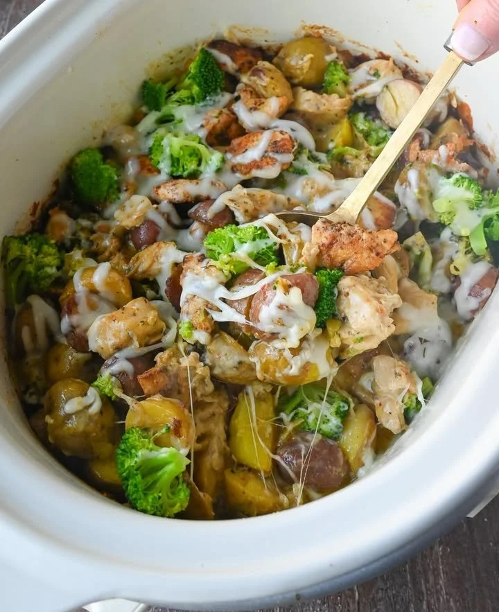 Slow Cooker Garlic Parmesan Chicken served with potatoes on a plate