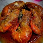 Delicious spicy masala prawns served with herbs and spices