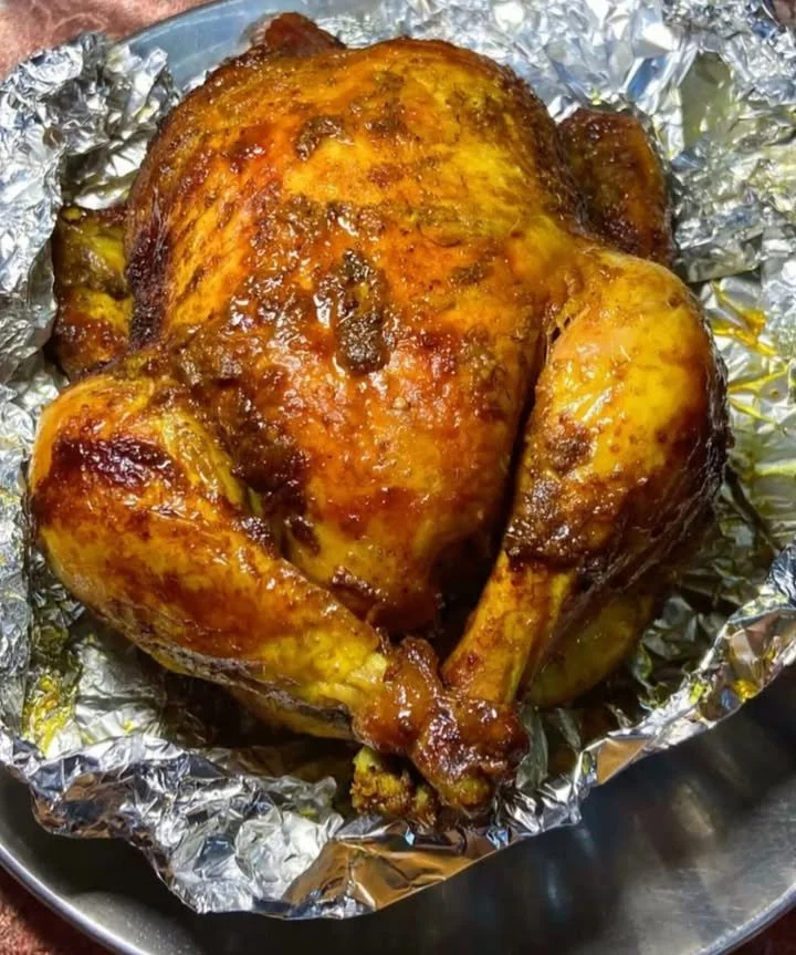 Stuffed Chicken Recipe Delicious stuffed chicken ready to be served with vibrant vegetables.