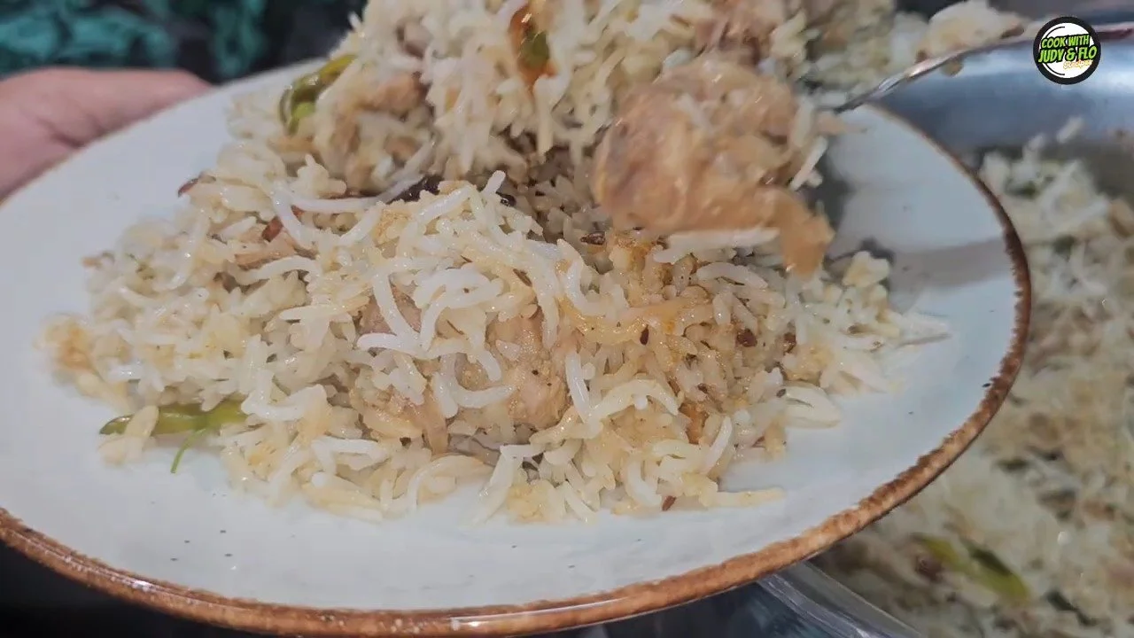 Delicious white chicken biryani served in a traditional style