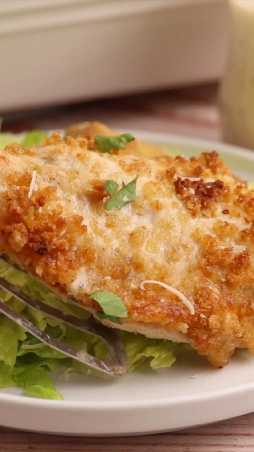 Baked Caesar Chicken dish featuring juicy chicken and flavorful Caesar dressing