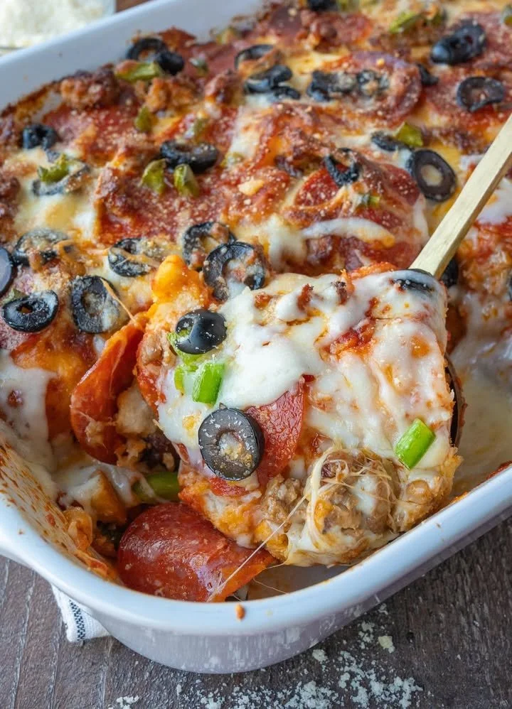 Delicious Bubble Up Pizza Bake ready to serve with melted cheese and toppings.