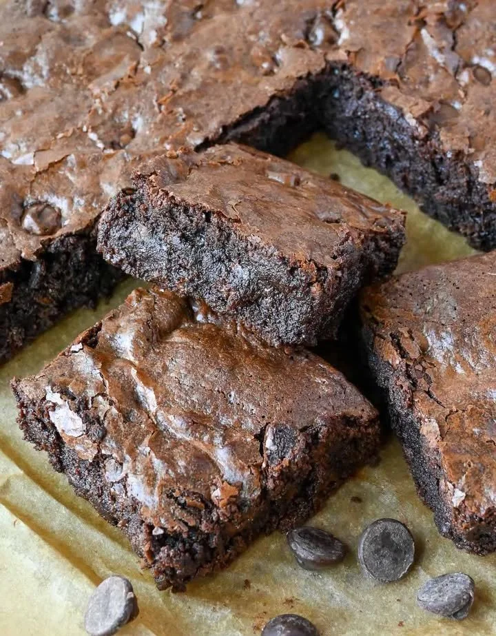 Delicious espresso brownies resembling Starbucks' recipe, topped with chocolate.