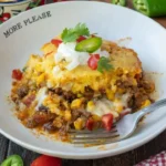 Delicious Cowboy Cornbread Casserole topped with golden cornbread crust