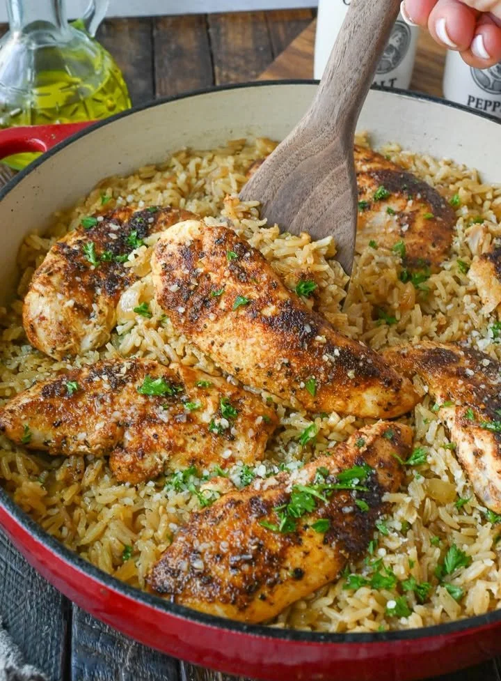 Garlic Chicken Rice Bake Delicious Garlic Chicken Rice Bake served in a rustic dish
