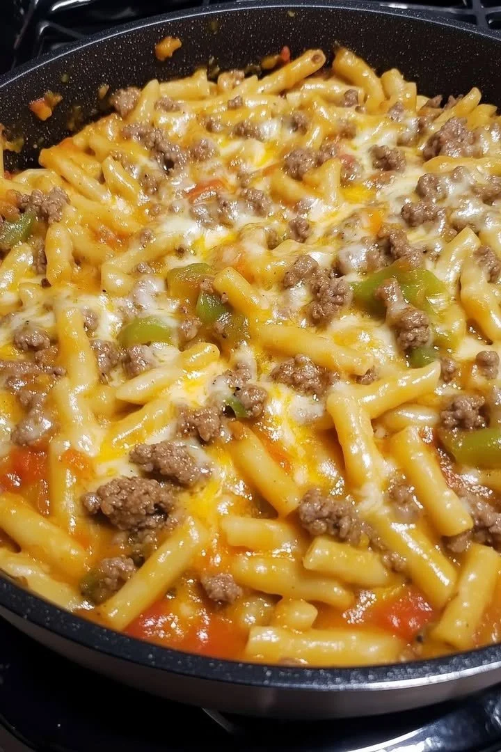 home A delicious Green Chile Hamburger served with toppings and sides.