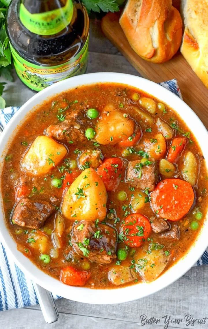 A bowl of hearty beef stew filled with tender meat and vegetables