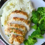 home Juicy and tender melt in your mouth chicken dish garnished with herbs.