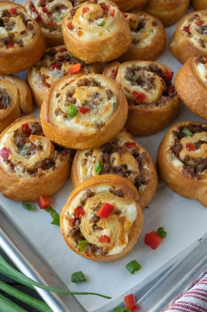 Delicious sausage pinwheels served on a platter for a party snack