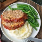 home Slow Cooker Meatloaf prepared with fresh ingredients for a hearty meal