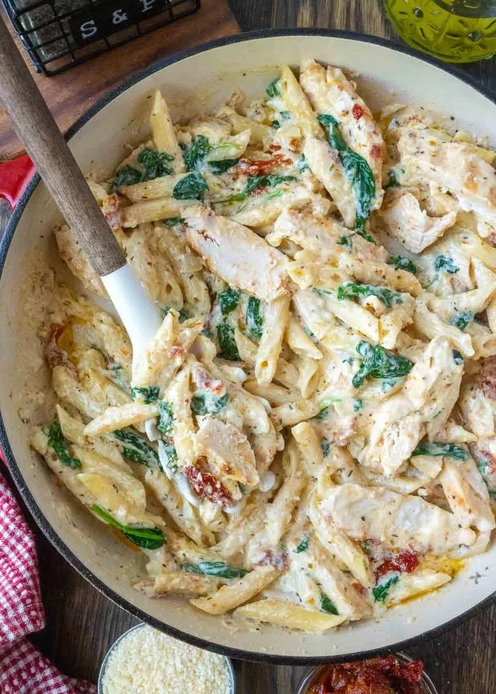 Delicious Tuscan Chicken Pasta with creamy sauce and sun-dried tomatoes