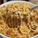 Delicious Velveeta Beef Pasta with Bowtie Noodles in a creamy cheese sauce.