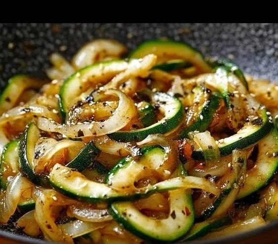 Japanese Zucchini and Onion Stir-Fry served in a bowl